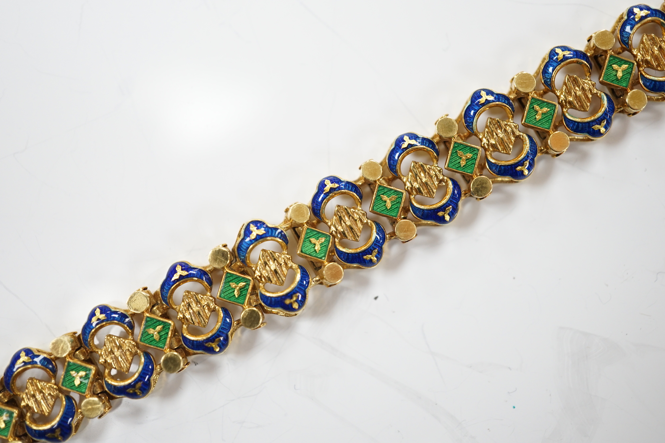 A 20th century Italian Uno-A-Erre 750 and two colour enamel set bracelet, 19cm, gross weight 33.4 grams.